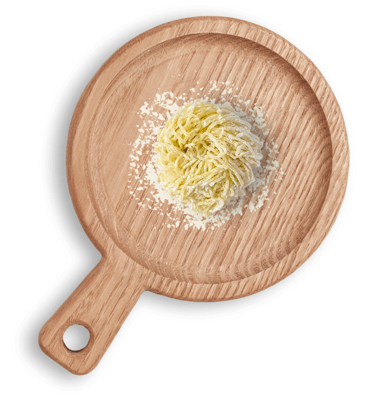 Free-ranged Egg Noodle on a wooden cutting board เส้นบะหมี่ไข่สดจากไข่แม่ไก่อารมณ์ดีบนเขียงไม้